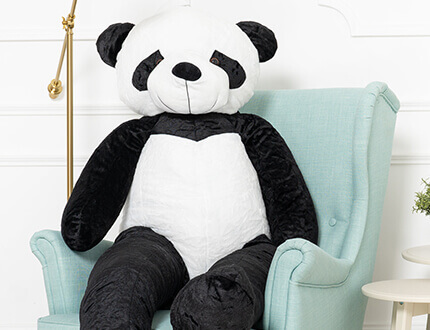 Grands pandas en peluche